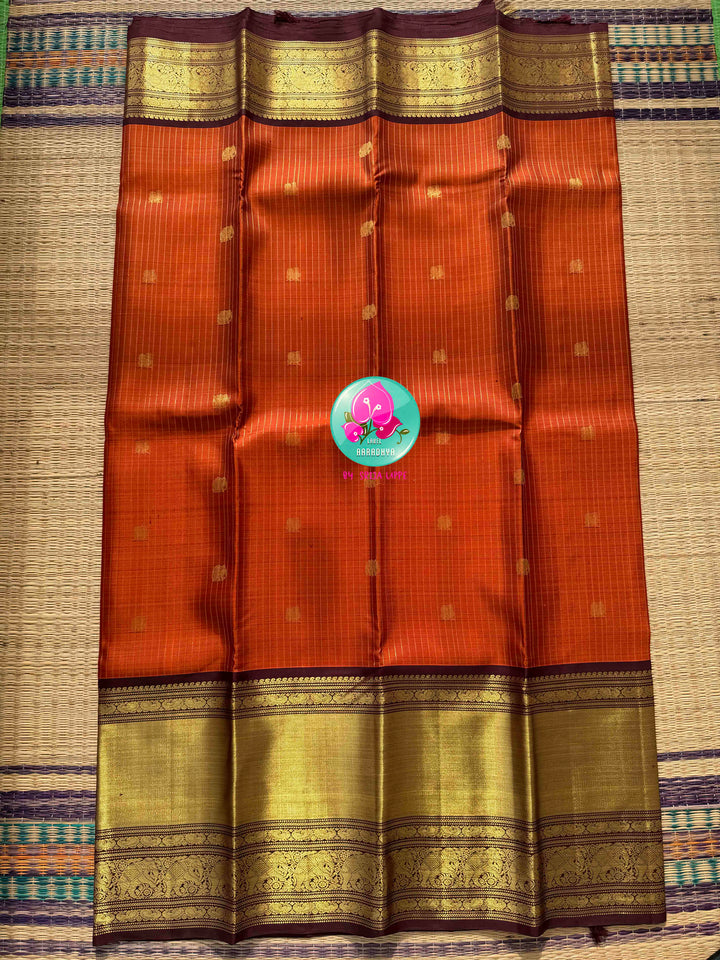 Vintage Earth & Gold: The Rust Orange Vaira Oosi Kanchipuram & Grand Artisan Borders