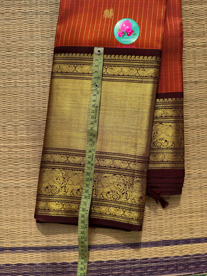 Vintage Earth & Gold: The Rust Orange Vaira Oosi Kanchipuram & Grand Artisan Borders