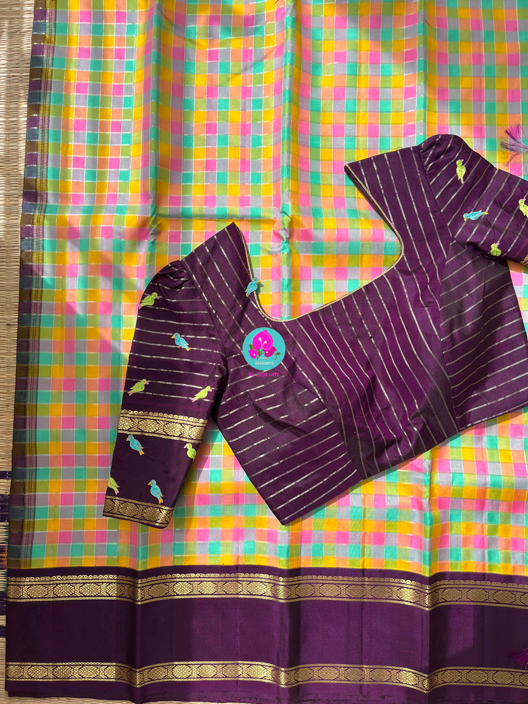 2g Zari multicoloured Madras checks paired with hand-embroidered bird theme blouse