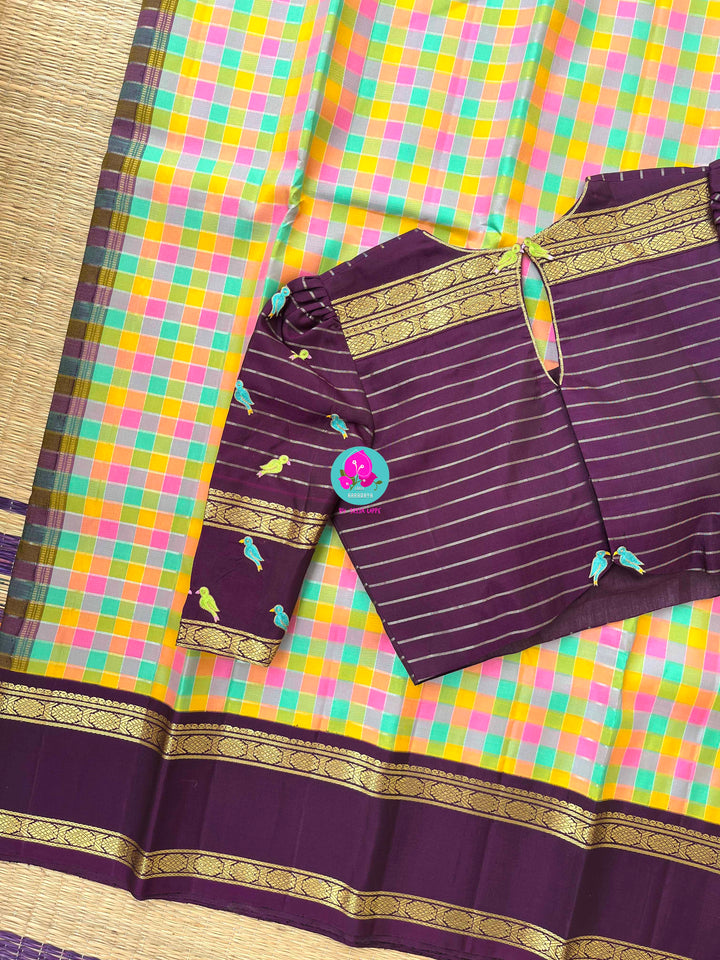2g Zari multicoloured Madras checks paired with hand-embroidered bird theme blouse