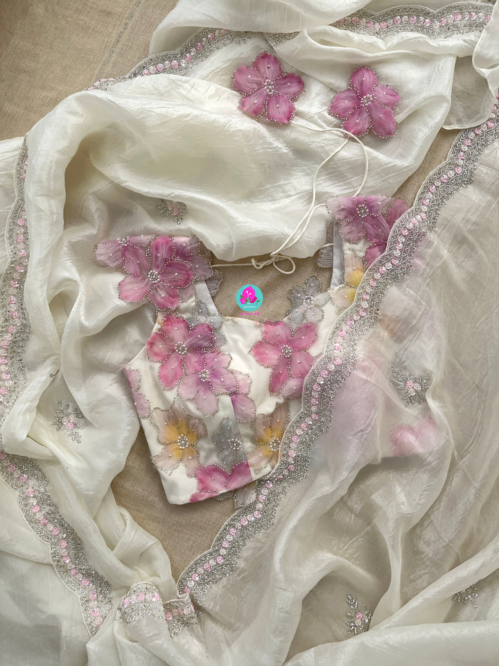 Crushed satin silk saree with sequins embroidery paired with Embellished Net Fashion Blouse
