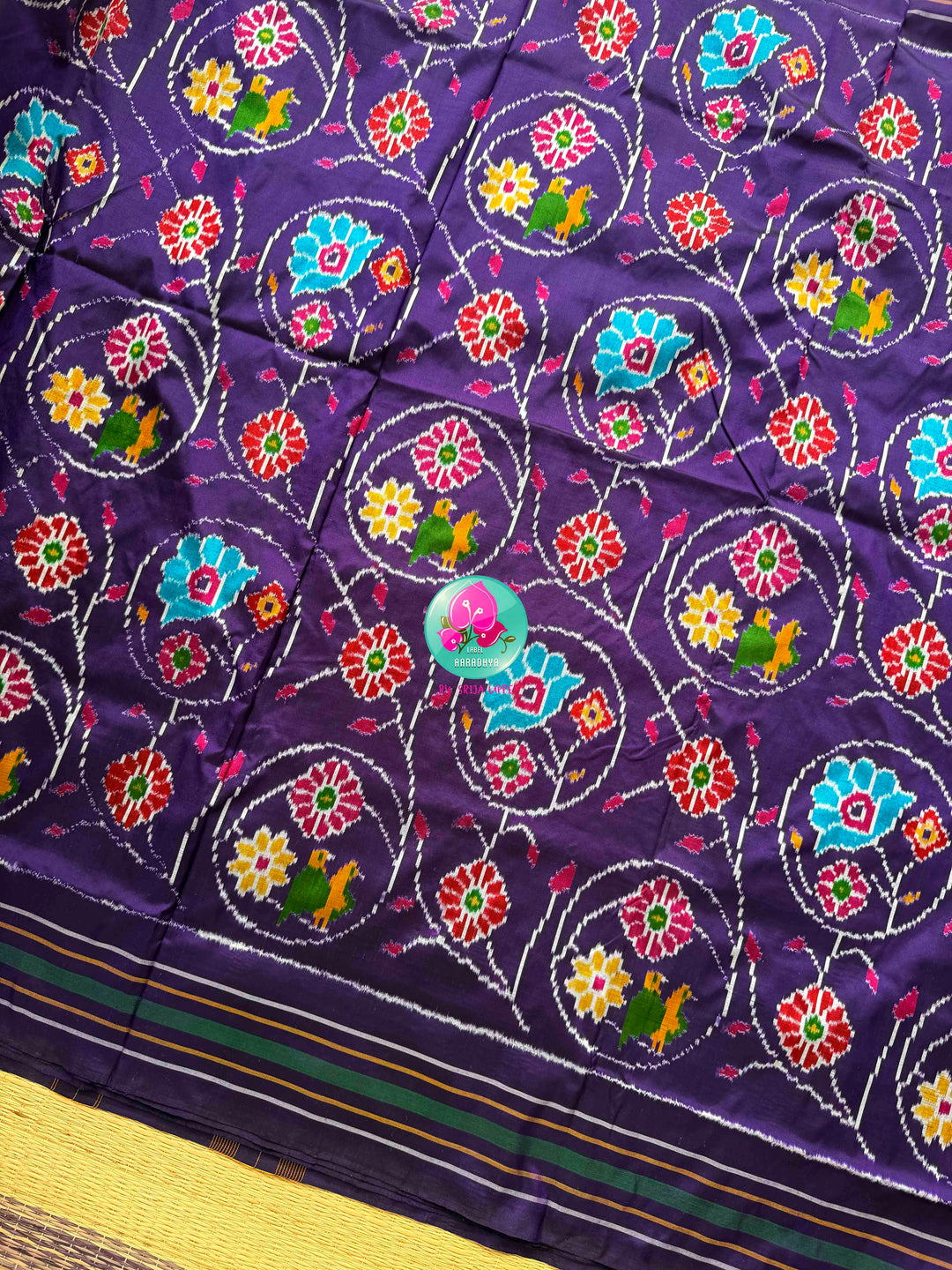 Regal Violet & Emerald Harmony: Pure Ikkat Silk & Madhubala Hand Embroidery