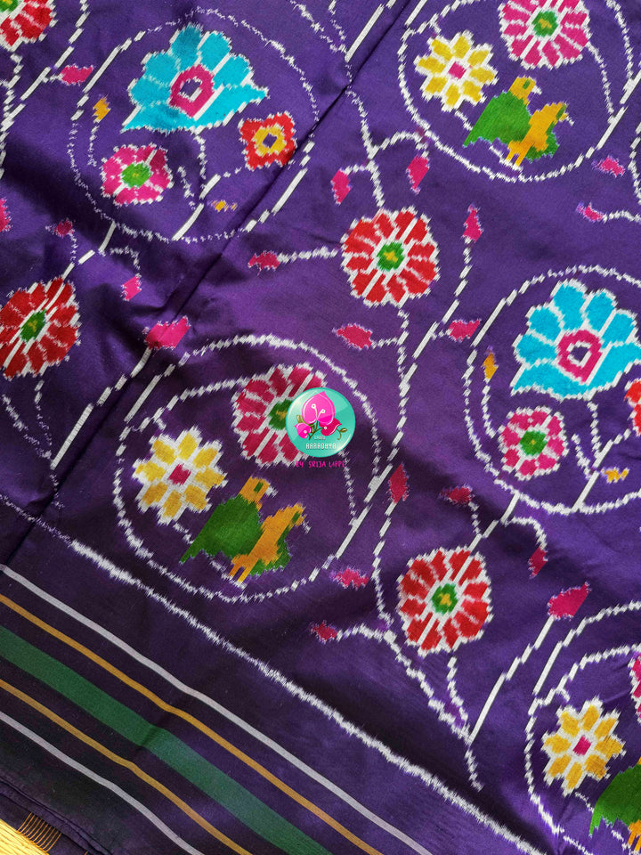 Regal Violet & Emerald Harmony: Pure Ikkat Silk & Madhubala Hand Embroidery